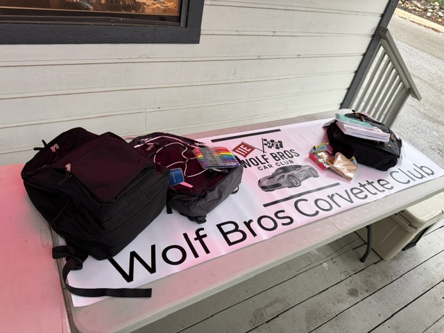 Wolf Bros Corvette Club backpack drive donation collection for Trulight127 Ministries.